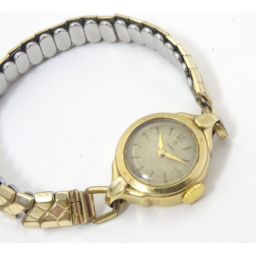 657 - Assorted ladies watches to include: 
A mid 20thC Tudor 9ct gold cased watch, together with two 9ct g... 