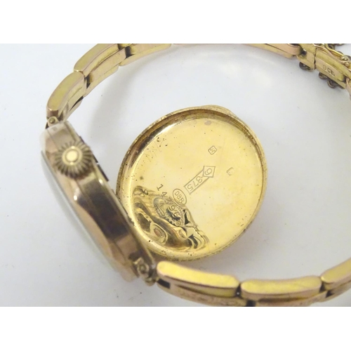 657 - Assorted ladies watches to include: 
A mid 20thC Tudor 9ct gold cased watch, together with two 9ct g... 