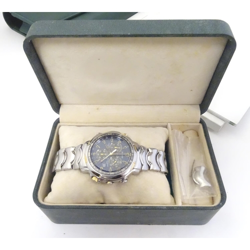 658 - A Jaguar 3510 gents wristwatch, cased with manual and warranty, together with a Jaguar X Type driver... 