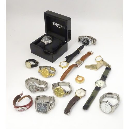 659 - A collection of mid to late 21stC wrist watches, including a cased Triumph (motorcycles) example, Sk... 