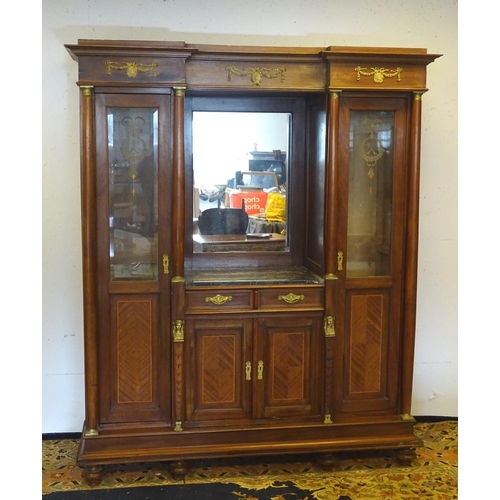 1385 - A mid 20thC continental mahogany cabinet having a recessed mirror back with grey marble top over two... 