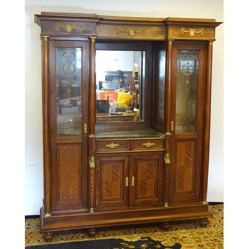 1385 - A mid 20thC continental mahogany cabinet having a recessed mirror back with grey marble top over two... 