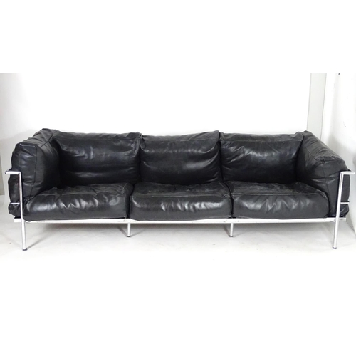 1565A - A mid 20thC Le Corbusier Grande Comforte sofa, with a chromed frame and feather filled cushions. Mea... 