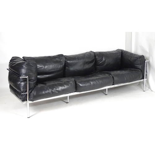 1565A - A mid 20thC Le Corbusier Grande Comforte sofa, with a chromed frame and feather filled cushions. Mea... 