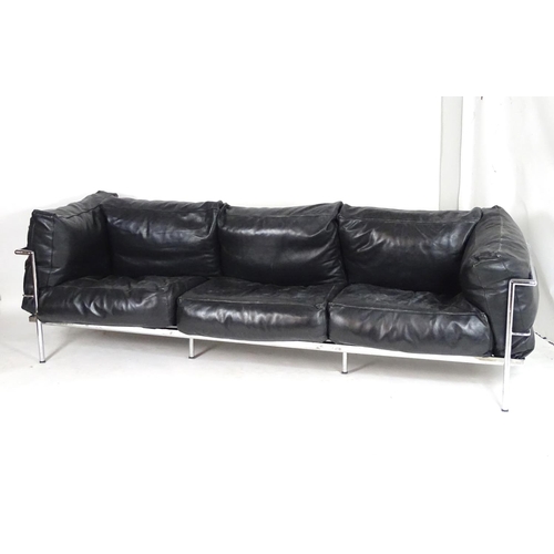 1565A - A mid 20thC Le Corbusier Grande Comforte sofa, with a chromed frame and feather filled cushions. Mea... 