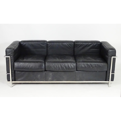 1565B - A mid 20thC chrome and leather Le Corbusier LC3 sofa. 70