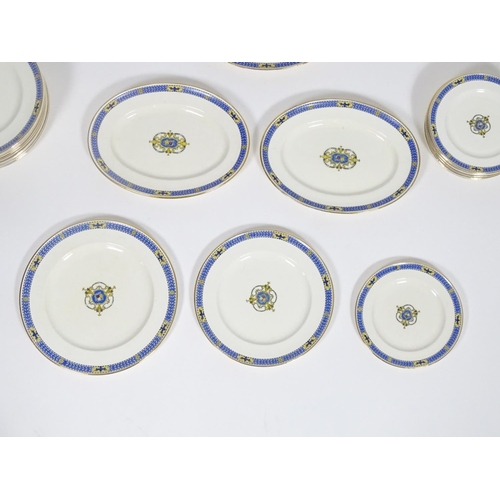 153 - A quantity of Royal Worcester dinner wares in the pattern Lichfield, comprising tureens, oval servin... 