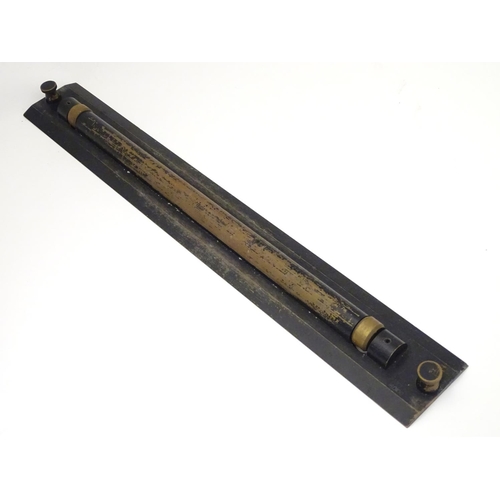 676 - Militaria: a mid to late 20thC cased naval navigational parallel rolling rule, the case marked 'Endu... 