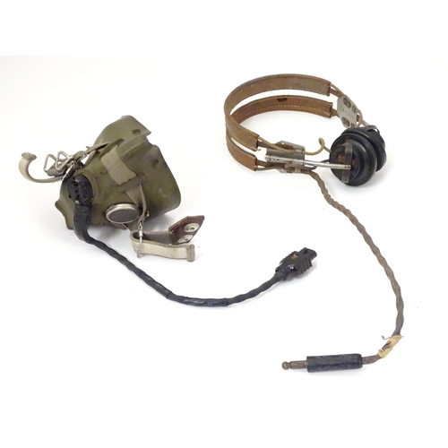 679 - Militaria: a 1960s Royal Air Force issue Type G flying helmet, blue airtex fabric with headphones an... 