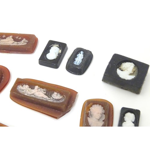 640 - A quantity of assorted cameo intaglios etc depicting various classical scenes.  etc The largest appr... 