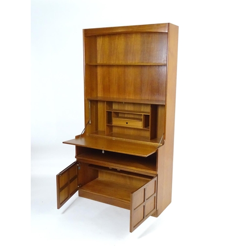 1567 - Vintage retro, mid-century: a 1970s teak wall board bureau bookcase by Nathan Furniture, comprising ... 