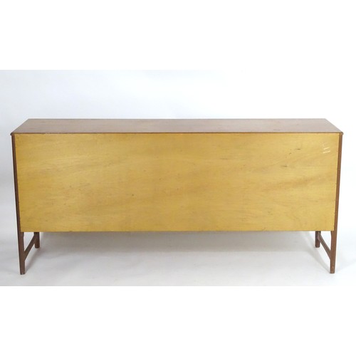 1566 - Vintage retro, mid-century: a 1970s teak sideboard by Nathan Furniture, composed of three cupboards ... 