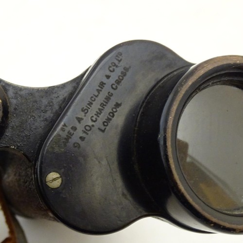 675A - An early 20thC cased pair of binoculars / field glasses by Ross, London marked with serial number 96... 