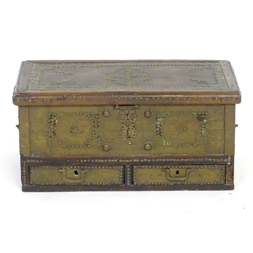 1374A - A 19thC Omani mule chest / dowry chest with metal bracket work decoration and applied studded detail... 