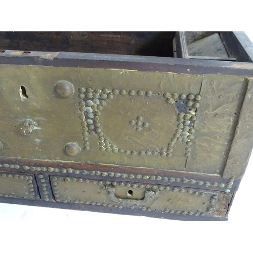 1374A - A 19thC Omani mule chest / dowry chest with metal bracket work decoration and applied studded detail... 