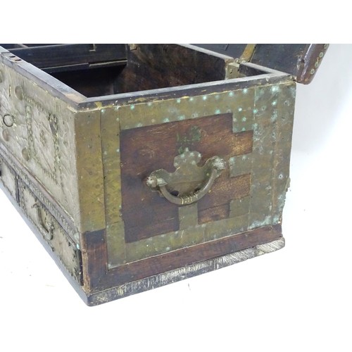 1374A - A 19thC Omani mule chest / dowry chest with metal bracket work decoration and applied studded detail... 