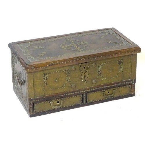 1374A - A 19thC Omani mule chest / dowry chest with metal bracket work decoration and applied studded detail... 