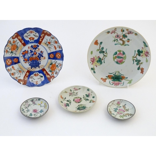 26 - Five assorted Oriental plates to include famille rose plates with floral and foliate detail, each ma... 