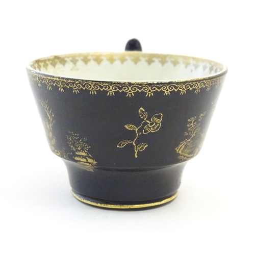 273 - A Booths Silicon China tea cup and saucer, together with two small plates with a black ground and gi... 
