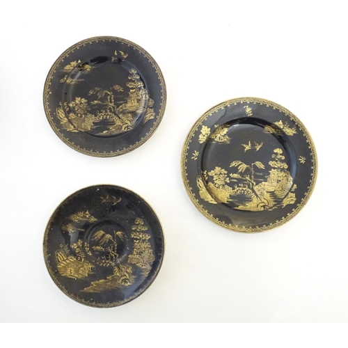 273 - A Booths Silicon China tea cup and saucer, together with two small plates with a black ground and gi... 
