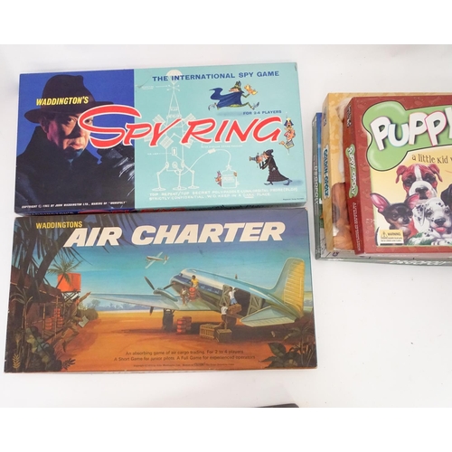 272 - A quantity of board games, some dog related, to include Scoop, Spy Ring, Air Charter, Blast Off, The... 