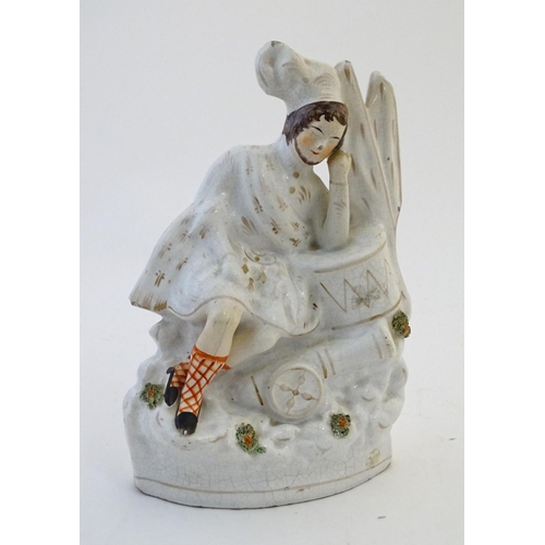 64 - A Staffordshire pottery flat back figure depicting a Scottish soldier resting on a drum with a canno... 