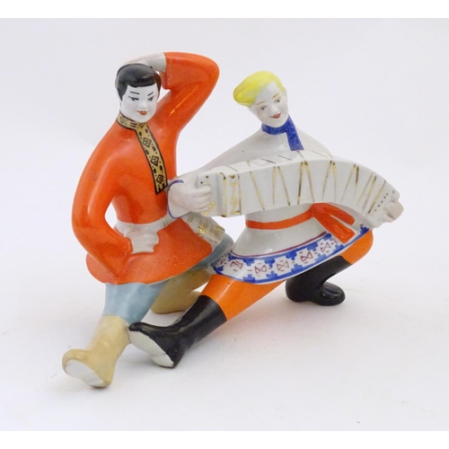 88 - A USSR / Ukrainian model of two dancers with a Russian accordion by Polonsky Factory of Artistic Cer... 