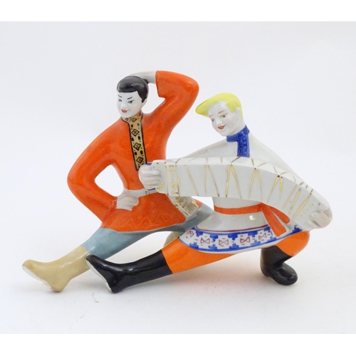 88 - A USSR / Ukrainian model of two dancers with a Russian accordion by Polonsky Factory of Artistic Cer... 