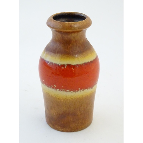 109 - A West German vase with banded detail. Marked under Scheurich 523-18. Approx. 7 1/4