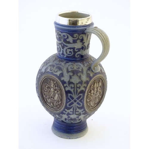 113 - A 19thC German salt glazed stoneware jug by Merkelbach & Wick, with a silver rim hallmarked Sheffiel... 