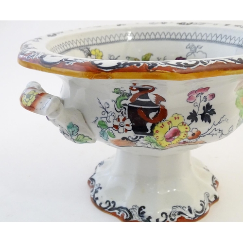 122 - A Masons Ironstone pedestal tureen with chinoiserie decoration depicting Oriental landscapes with pa... 