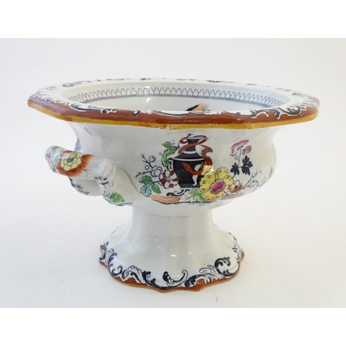 122 - A Masons Ironstone pedestal tureen with chinoiserie decoration depicting Oriental landscapes with pa... 