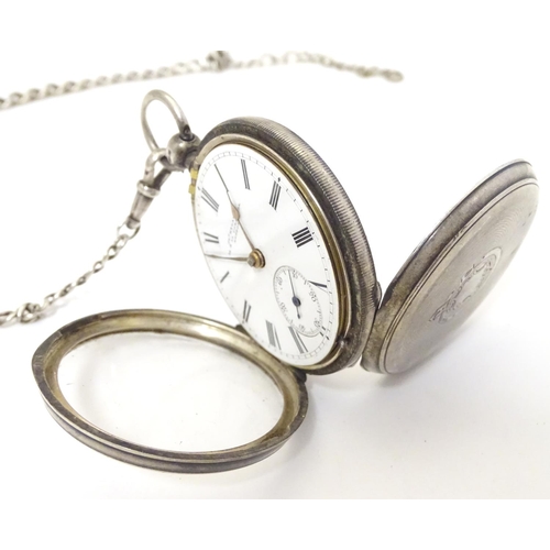 962 - A Victorian silver pocket watch with enamel dial signed Jno Hyland, 32 & 53 Cheapside London, and en... 