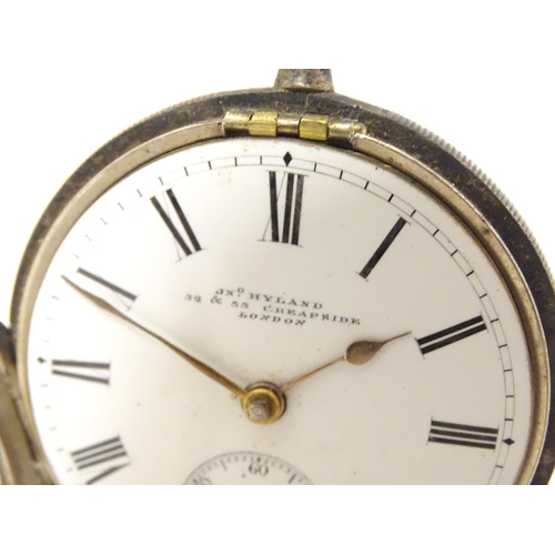 962 - A Victorian silver pocket watch with enamel dial signed Jno Hyland, 32 & 53 Cheapside London, and en... 