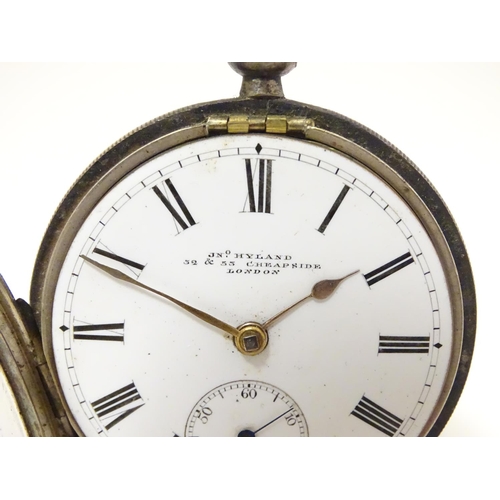 962 - A Victorian silver pocket watch with enamel dial signed Jno Hyland, 32 & 53 Cheapside London, and en... 