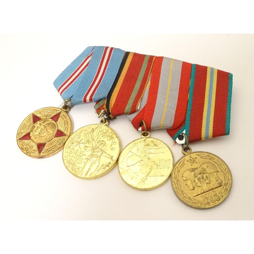 1012 - Militaria: a group of four USSR red army commemorative medals, comprising a 70 Years of the Armed Fo... 