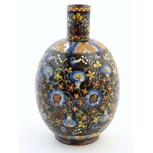 101 - A Thoune style vase with a bulbous body decorated with scrolling floral and foliate detail. Approx. ... 