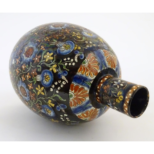 101 - A Thoune style vase with a bulbous body decorated with scrolling floral and foliate detail. Approx. ... 