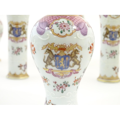 115 - Six Continental vases with hand painted armorial detail, comprising two bud vases, three small balus... 