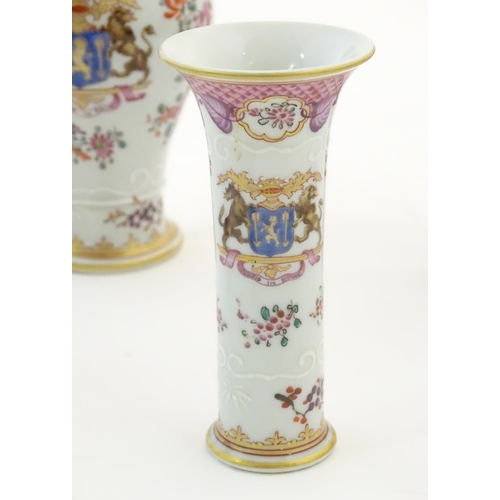 115 - Six Continental vases with hand painted armorial detail, comprising two bud vases, three small balus... 