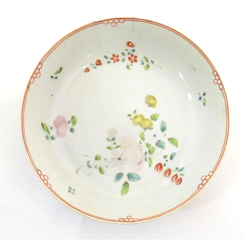 117 - A New Hall style saucer with hand painted floral and foliate detail. Together with another. Largest ... 