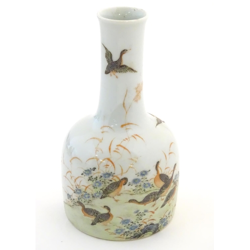 26 - A Chinese bottle vase decorated with a landscape scene with ducks / birds. Character marks under. Ap... 