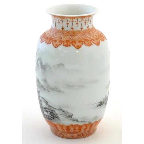 55 - A Chinese small vase with monochrome mountainous landscape detail and orange banded borders. Approx.... 