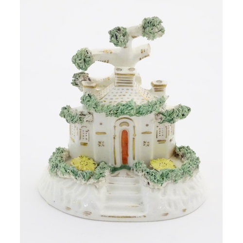 77 - A Staffordshire pottery model of a cottage. Approx. 4 1/4