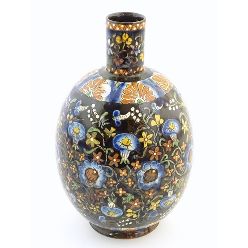 101 - A Thoune style vase with a bulbous body decorated with scrolling floral and foliate detail. Approx. ... 