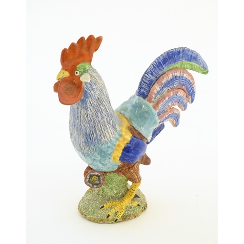 135 - A model of a cockerel / rooster with hand painted detail. Approx. 6 1/2