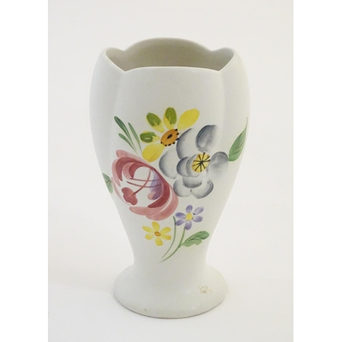 139 - A Radford hand painted vase with floral and foliate detail. Marked under. Approx. 5 1/2