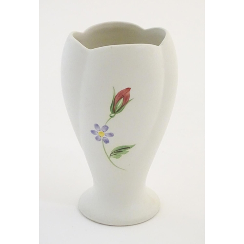 139 - A Radford hand painted vase with floral and foliate detail. Marked under. Approx. 5 1/2