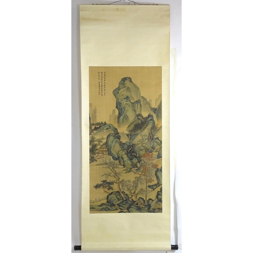 2458 - A large Chinese watercolour scroll depicting a mountainous landscape scene with waterfalls, forests,... 