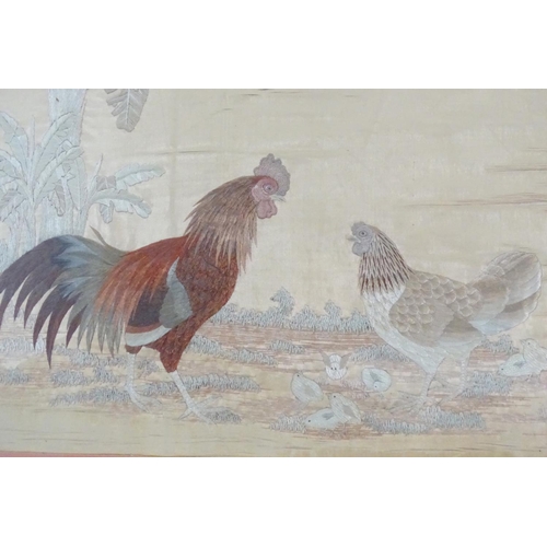 2528 - A Chinese embroidery / needlework depicting a cockerel, chicken and chicks in a landscape. Character... 